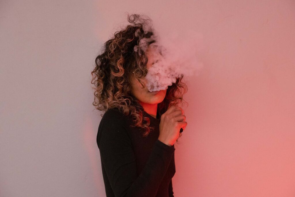 portrait-of-woman-smoking-a-vape-DABX5PY.jpg